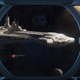 A window view of the Halycon galactic starcruiser flying through space.
